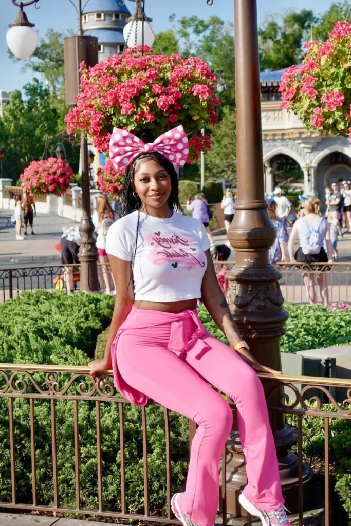 White Graphic Crop Top + Hot Pink Flair Pants + Pink and White Sneakers