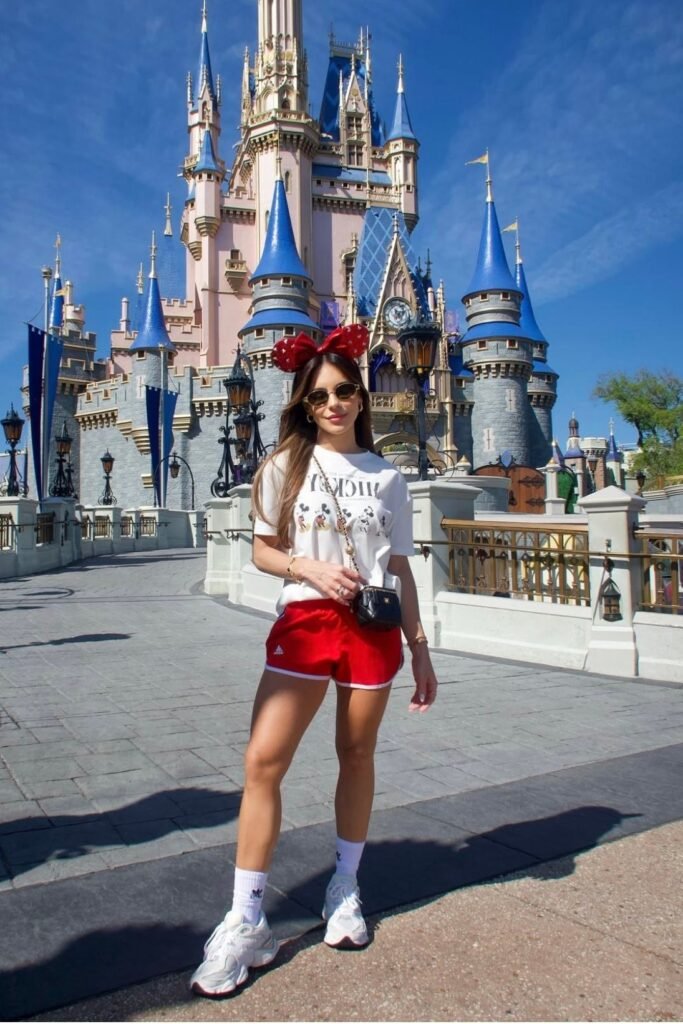 White Graphic Mickey Mouse T Shirt + Red Athletic Shorts + Red Minnie Mouse Ears + White Sneakers