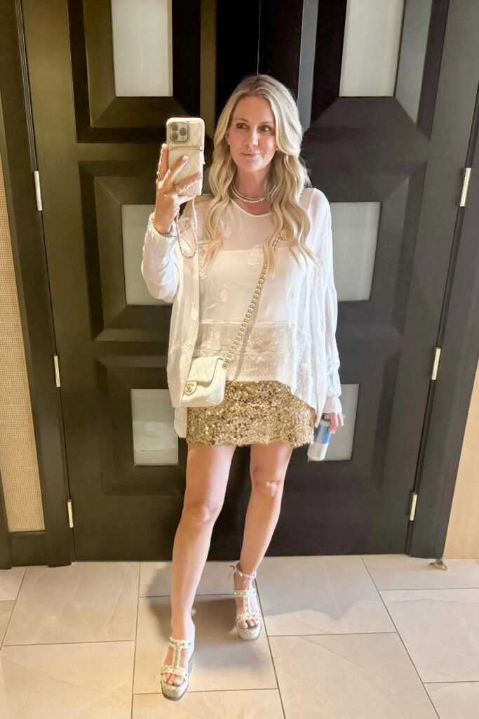 White Graphic T Shirt + Beige Shorts + Fishnet Tights + Black Combat Boots