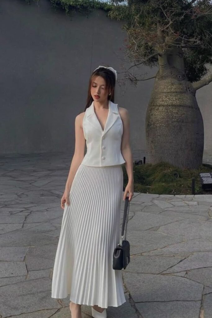 White Halter Vest + White Pleated Midi Skirt + Black Shoulder Bag