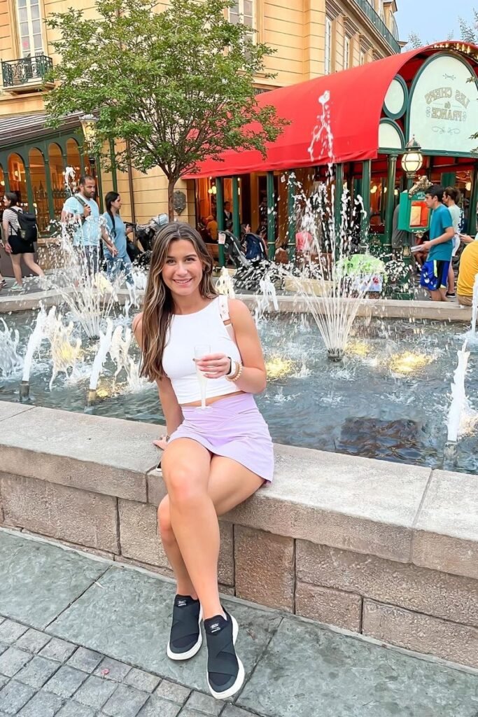 White High Neck Crop Top + Pastel Lavender Mini Skirt + Black Cross Strap Slip on Sneakers