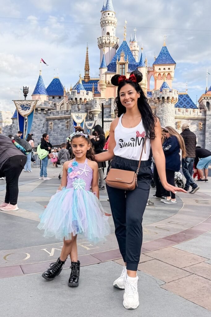 White Minnie Mouse Graphic Tank Top + Black Joggers + White Platform Sneakers