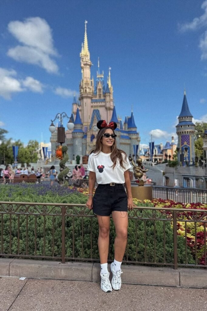 White Pocket Tee with Mickey Logo + Black Denim Shorts + White Sneakers with High Socks