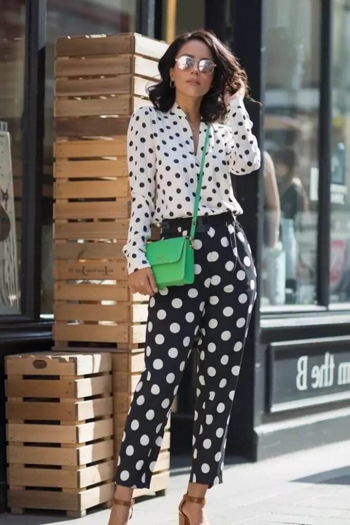 White Polka Dot Blouse + Black Polka Dot Trousers + Green Crossbody Bag