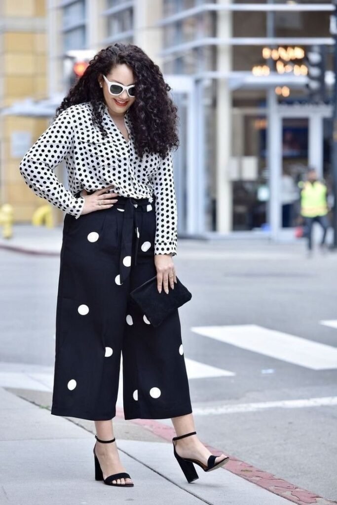 White Polka Dot Button Down Shirt + Black Wide Leg Polka Dot Trousers + White Retro Sunglasses + Black Suede Clutch + Black Block Heel Sandals