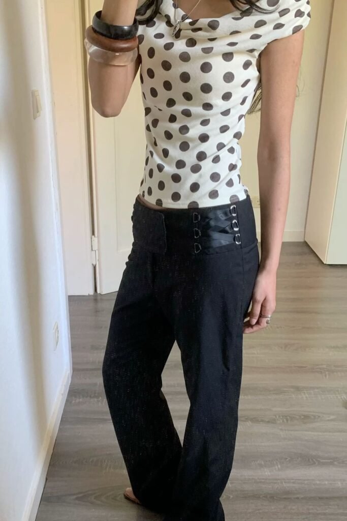White Polka Dot Cowl Neck Top + Black Lace-Up Trousers + Gold Bangles