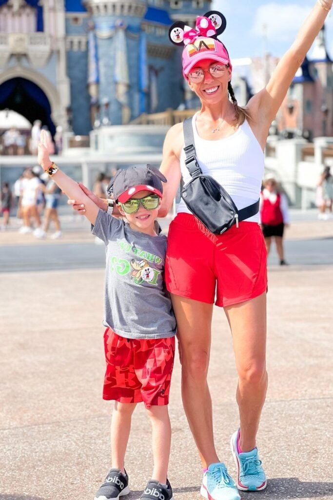 White Ribbed Tank Top + Red Running Shorts + Blue Performance Sneakers