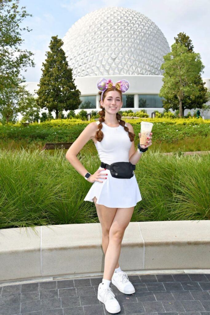 White Ribbed Tank Top + White Tennis Skirt + Black Belt Bag + White Sneakers