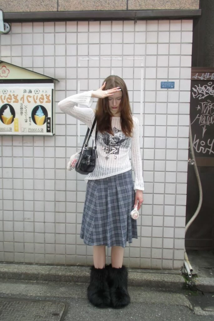 White Sheer Long Sleeve Graphic Top + Grey Plated Skirt + Black Furry Boots