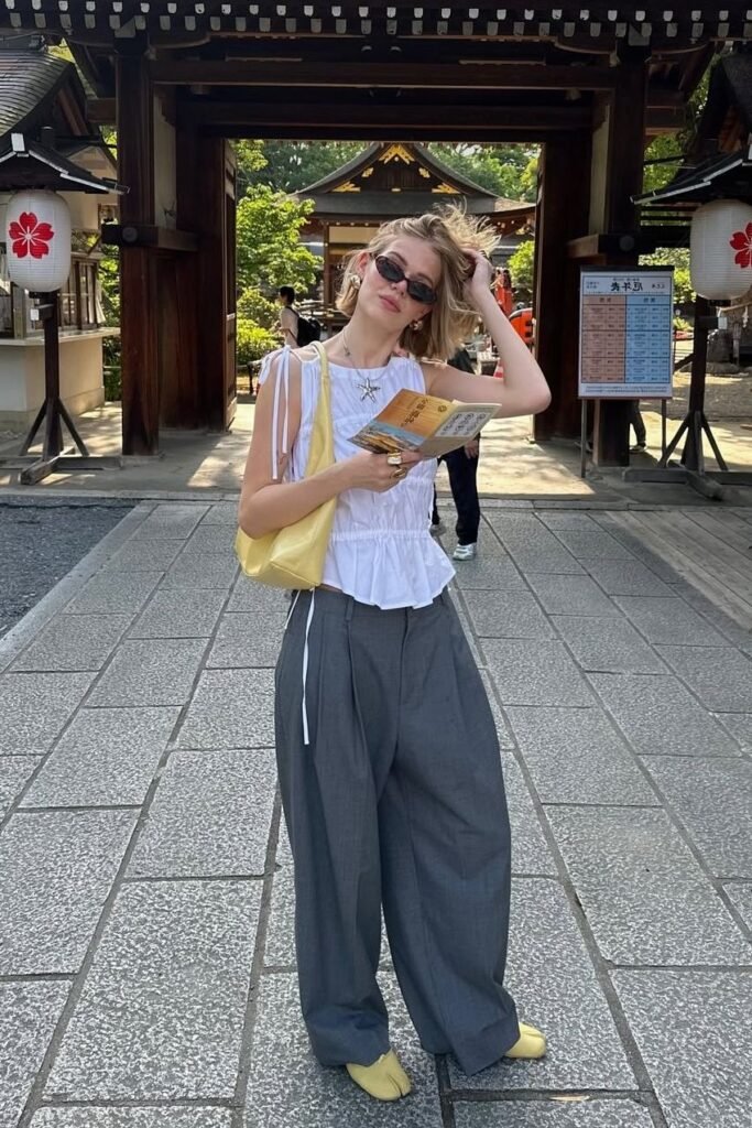 White Sleeveless Blouse + Grey Wide Leg Trousers + Yellow Tabi Shoes