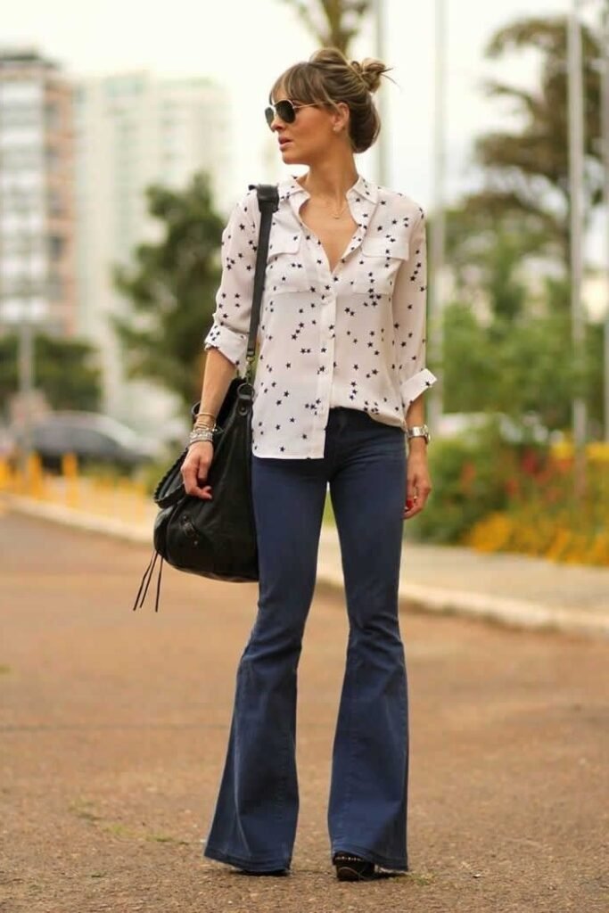 White Star Print Button Down Shirt + Navy Blue Flared Jeans + Black Shoulder Bag