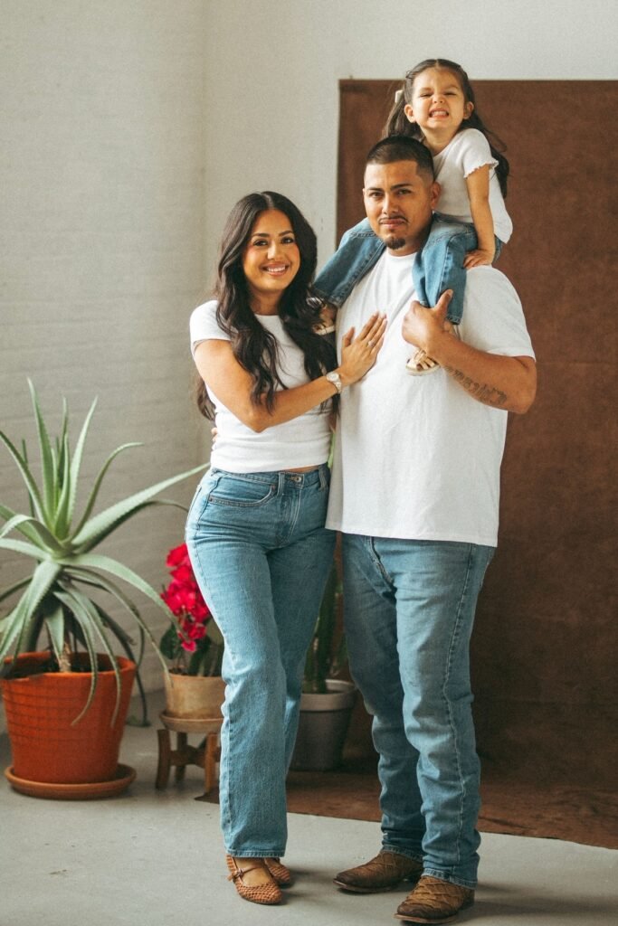 White T Shirt + Light Wash Jeans + Brown Cowboy Boots