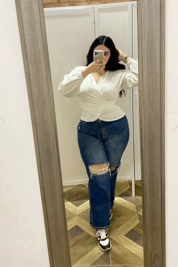 White V Neck Wrap Top + Dark Wash Distressed Jeans + Black and White Sneakers