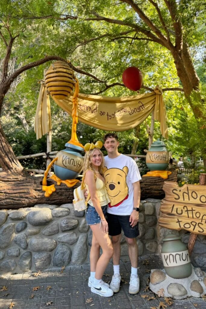 Winnie the Pooh T Shirt / Yellow Tiered Tank Top + Black Shorts / Denim Shorts + White Low Top Sneakers / Black Swoosh Platform Sneakers