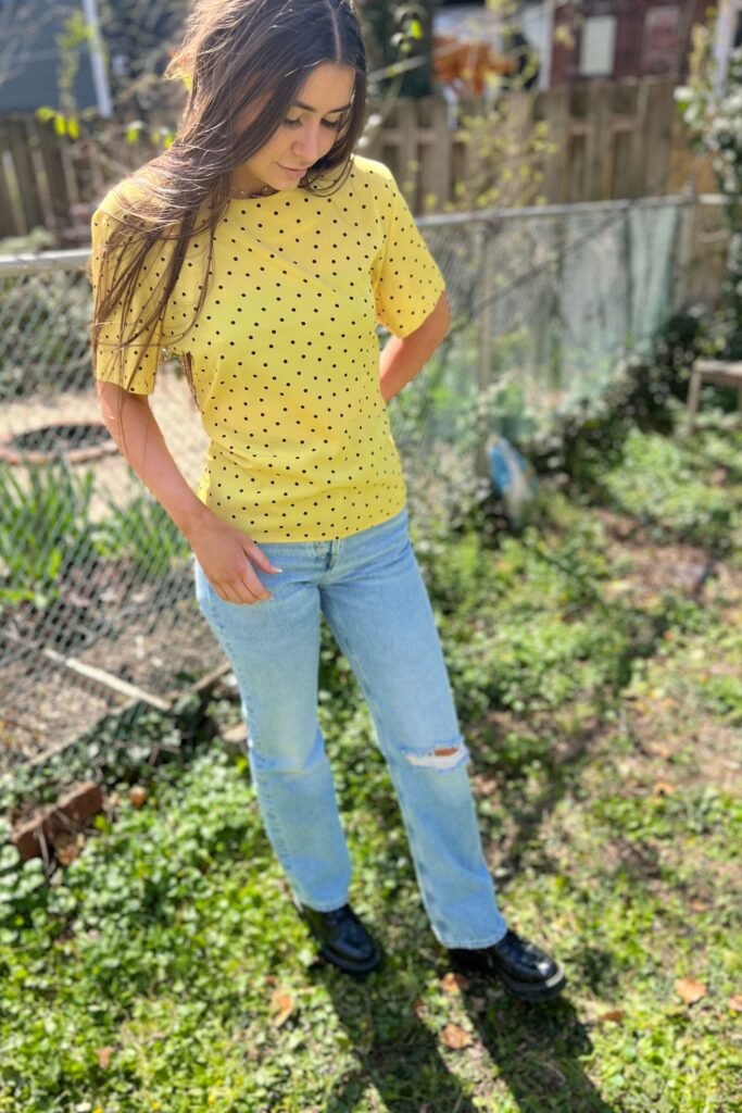 Yellow Polka Dot Short-Sleeved Top + Light Wash Ripped Jeans + Black Boots
