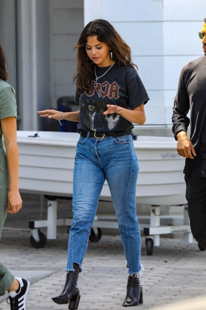 Black Graphic T Shirt + Blue Distressed Jeans + Black Belt + Black Heeled Boots