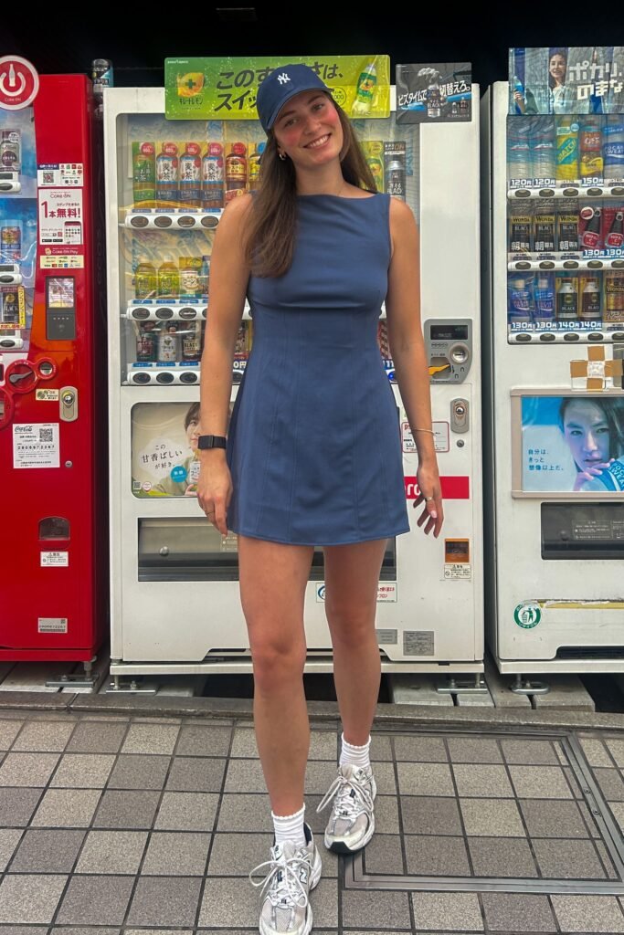 Blue Mini Dress + New York Yankees Cap + White Sneakers