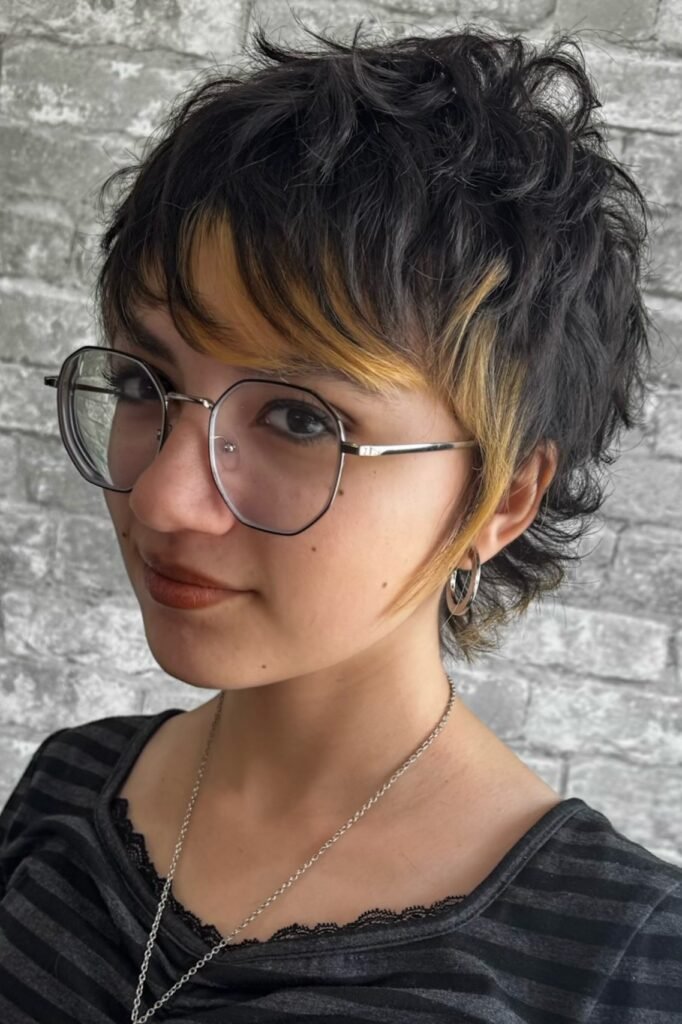 42. Choppy Pixie with Blonde Face-Framing Highlights