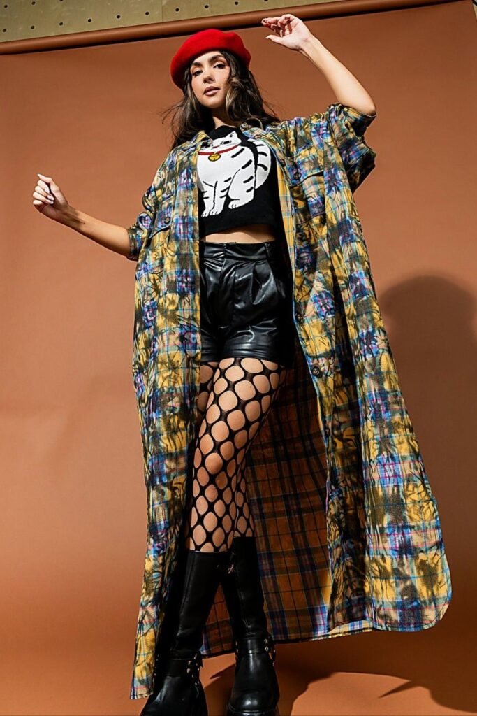 Graphic Crop Top + Black Leather Shorts + Fishnet Tights + Long Plaid Shirt + Red Beret + Black Boots