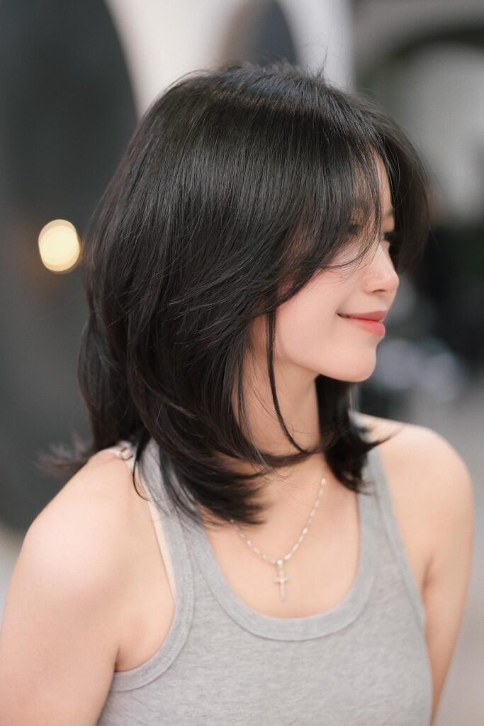Soft Layered Mid-Length Cut with Natural Movement