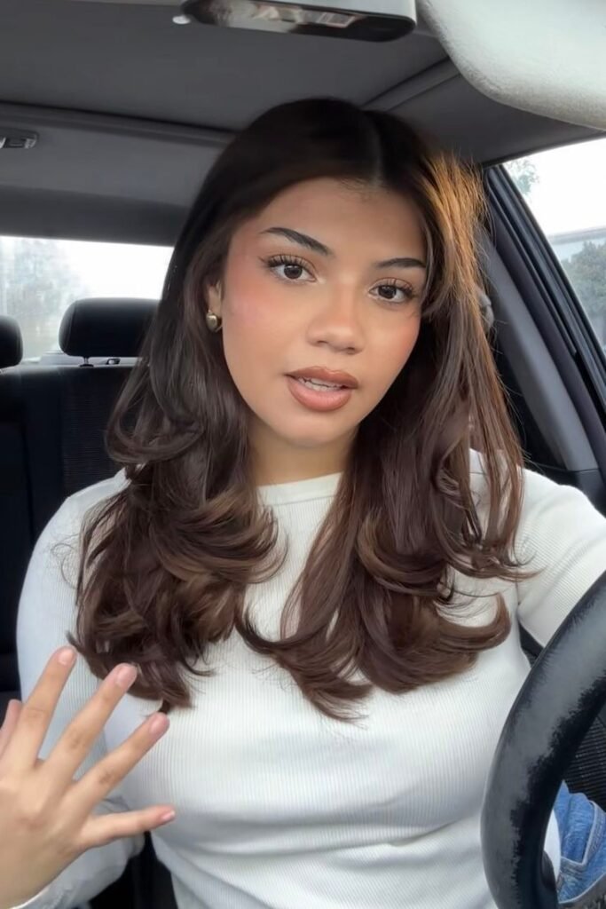 Voluminous Soft Layers with Curtain Bangs