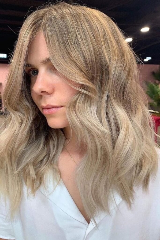 Wavy Blonde Lob with Face-Framing Layers