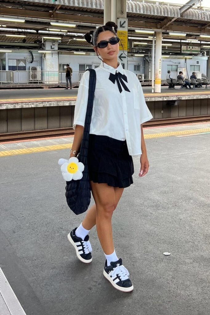 White Collared Shirt + Black Mini Skirt + Casual Sneakers