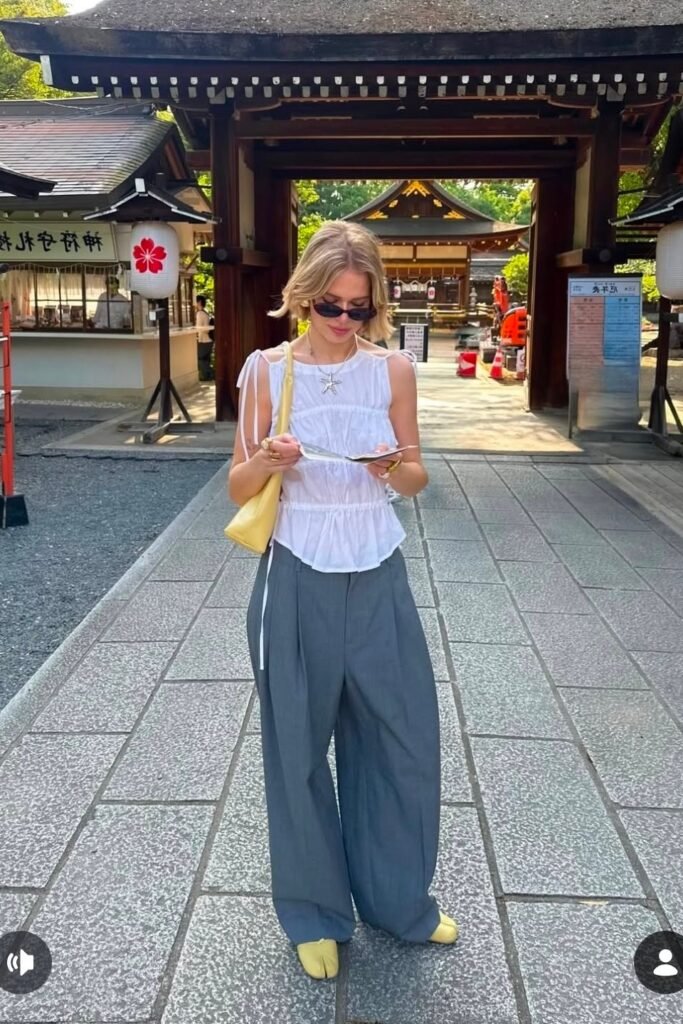 White Sleeveless Blouse + Grey Wide Leg Trousers + Yellow Tabi Shoes