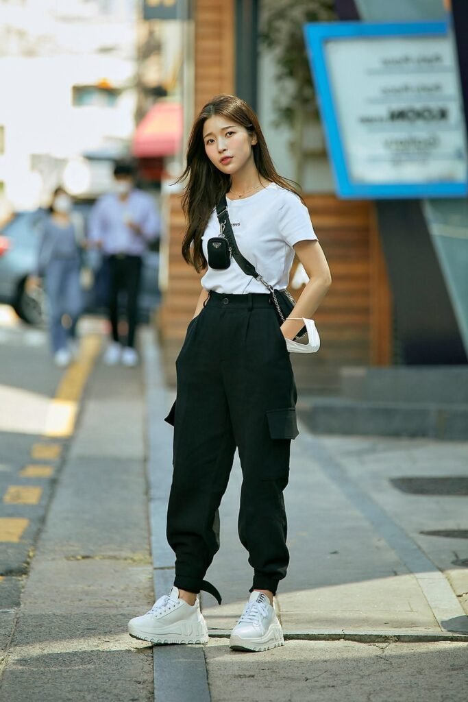 White T Shirt + Black Cargo Joggers + White Sneakers + Crossbody Bag