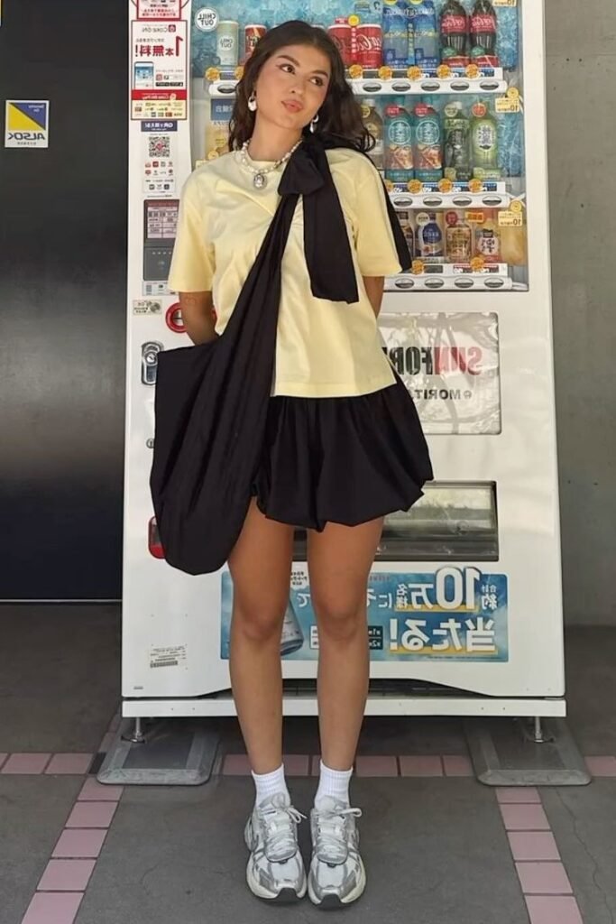 Yellow T Shirt + Black Mini Skirt + Silver Sneakers