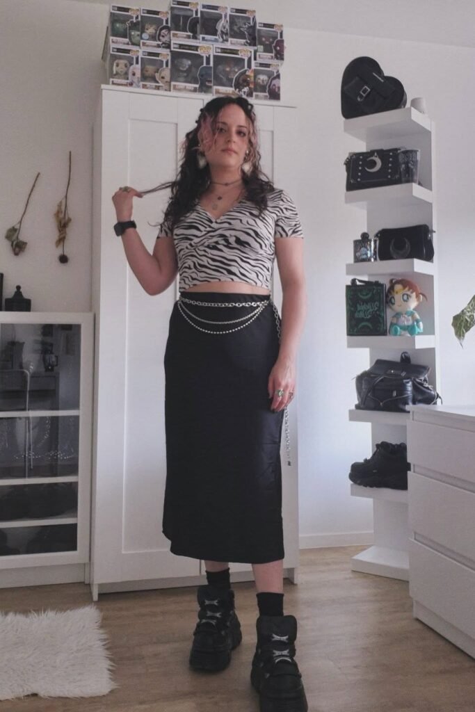 Zebra Print Crop Top + Black Midi Skirt + Chain Belt + Platform Sneakers