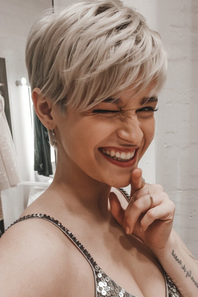 Layered Platinum Pixie with Textured Side Swept Bangs