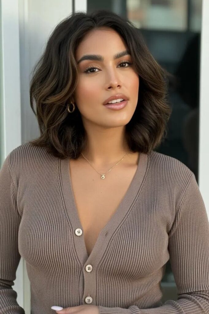 Medium-Length Wavy Bob with Subtle Highlights