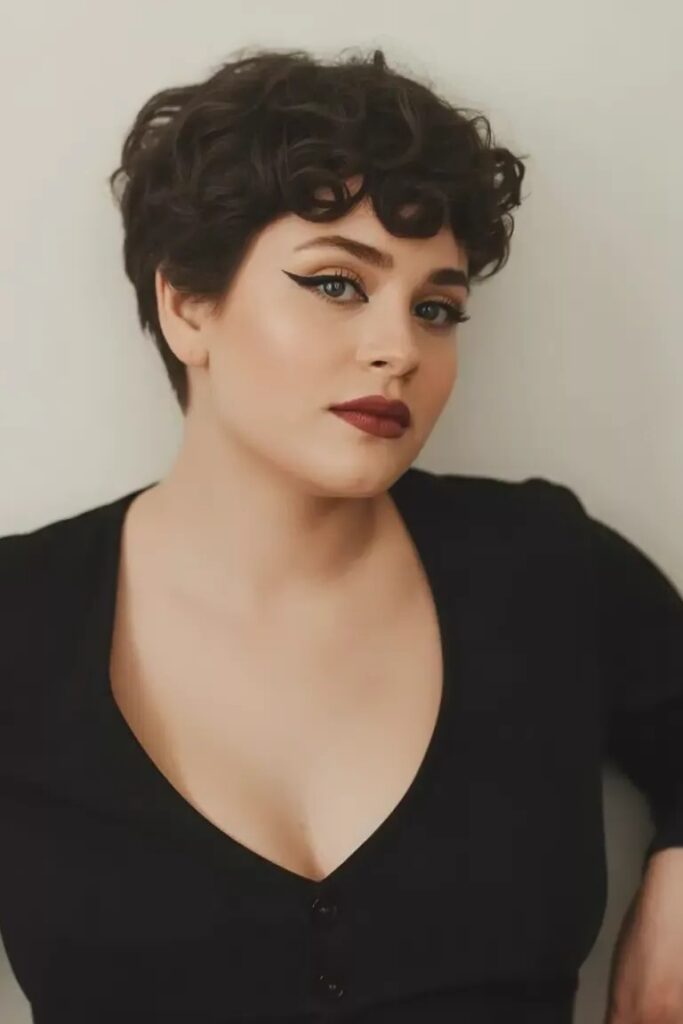 51. Short Curly Pixie Cut with Finger Waves and Dark Hair