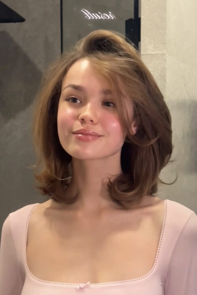 Voluminous Shoulder-Length Layered Hair